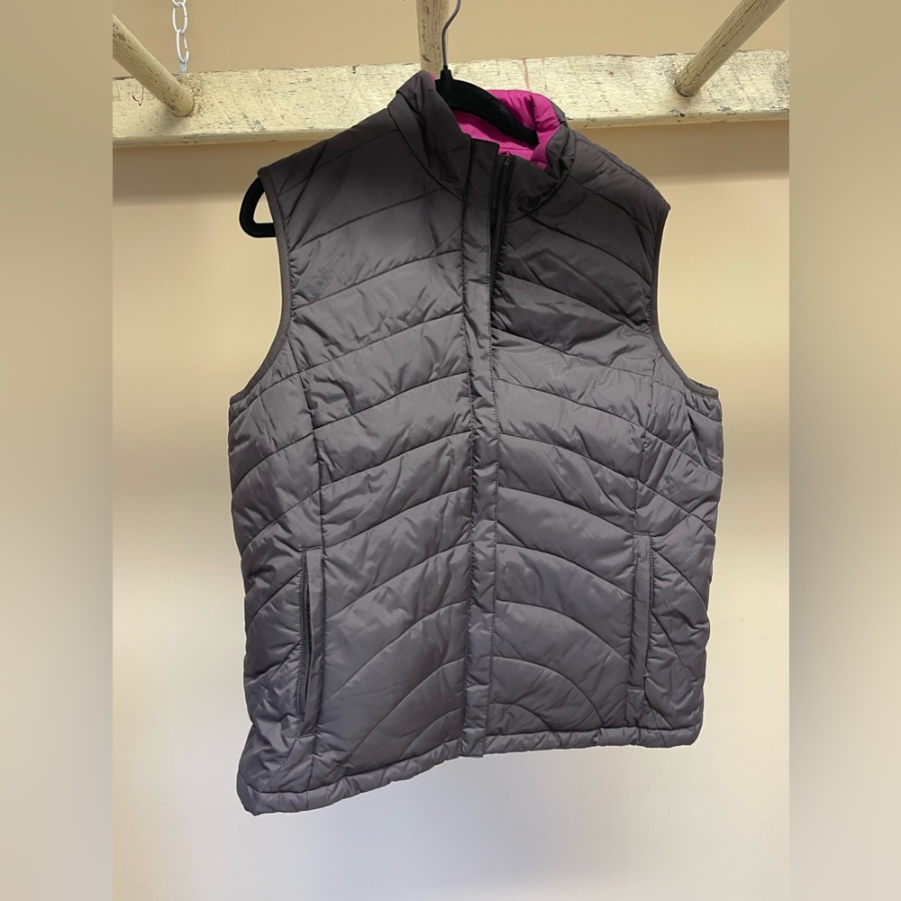 Brand: Lands End, women’s brown vest with a pink lining, size small (6-8)